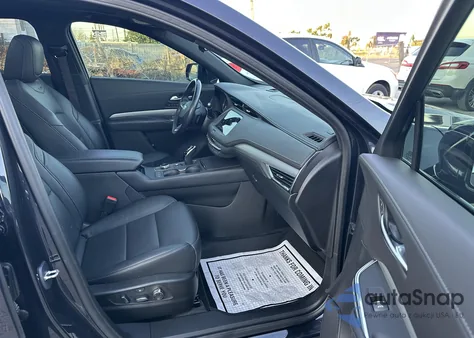 2023 Cadillac Xt4 Awd Premium Luxury z USA, uszkodzony, nr VIN 1GYFZDR43PF174188